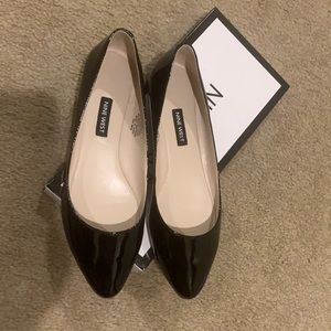 Nine West flats. Black Patent. size 7. NEVER WORN!